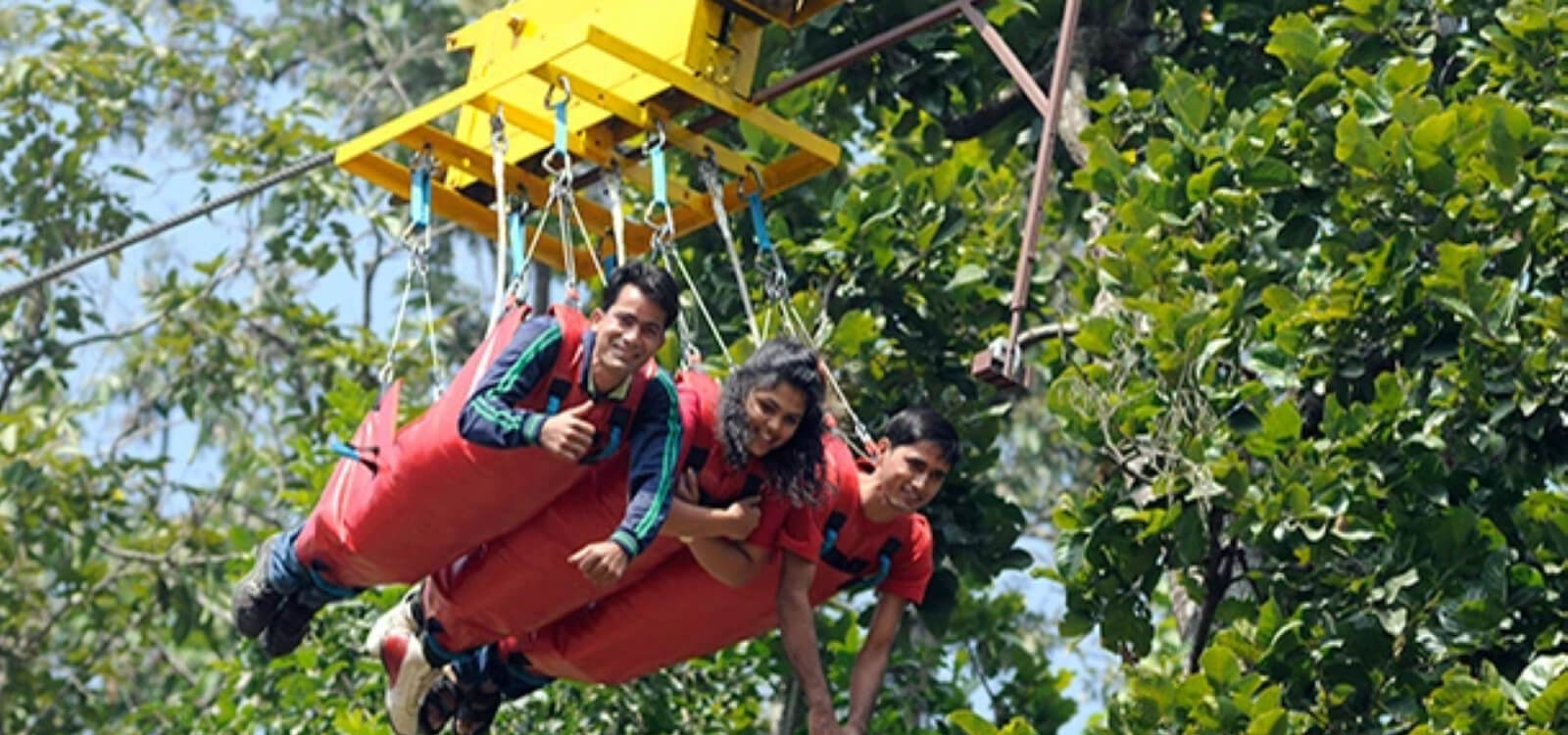 people enjoying flying fox in rishikesh